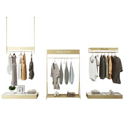 China Custom Chinese Retail Store Project Stainless Steel Clothes Rack Display Picture for sale