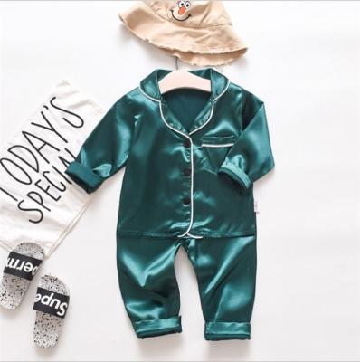 China Fashionable SHINY QUICK DRY Homewear Button Print Silk Pajamas Kids Sets Long Sleeve Satin Sleepwear Kids Set for sale