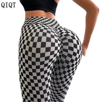 China Breathable Fashion Trendy Plaid Printed Stretch Yoga Pants High Waist Hips Sports Tights Fitness Gaiters for sale