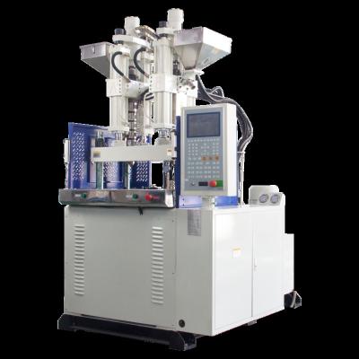 China VERTICAL double color injection molding machine TA-1200R-2C/kn for sale