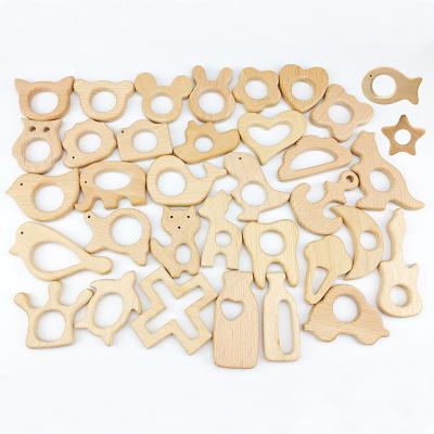 China Toy Wholesale Wood Necklace Soft Pendant Charms Beech Gift DIY Wooden Teether Toys Baby Soft Accessory for sale