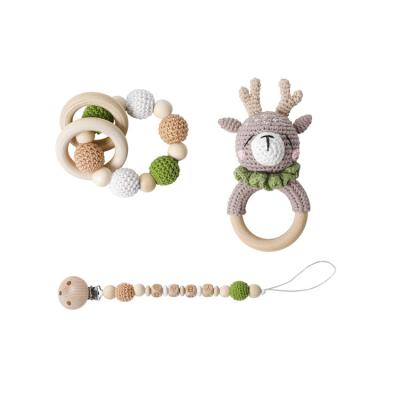 China Food Grade Washable and Easy Clean Silicone Crochet Teether Toy Wooden Animal Rattle Toy and Bracelet Pacifier Chain Set for sale