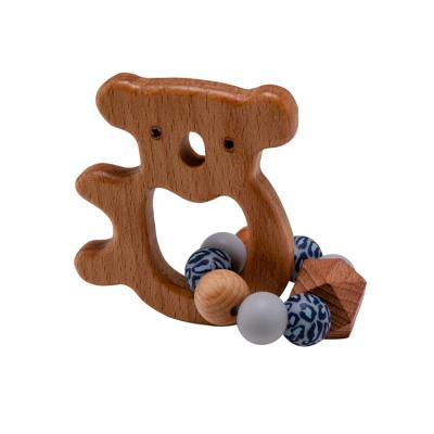 China Soft Toy Beech Olive Oil Animal Print Baby Teething Hand Rattle Natural Wooden Bracelet for sale