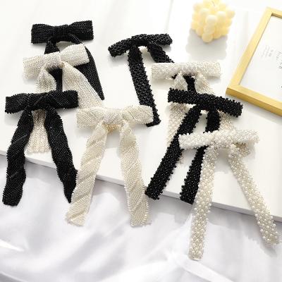 China 2021 European and American style hair accessories pearl hair clips hair clips hairpin hairpin long pearls ribbon bow France barrettes for sale