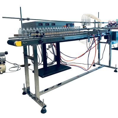 China Automatic Food Vacuum Negative Pressure Small Liquid Filler Four Nozzles Bottle Flavor Filling Machine Production Line for sale