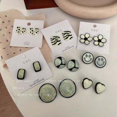 China TRENDY oorbellen Earring Fashion Smiley Bow Flower Hoop Earrings Korean Women Black White Drops Earrings for sale