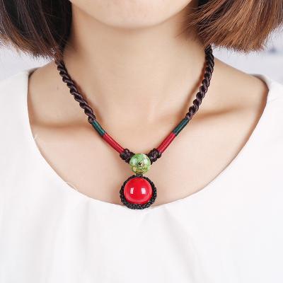 China FASHIONABLE Retro Ethnic Style Red Ball Handmade Valentine Knot Natural Stone Woven Pendant Necklace for Women for sale