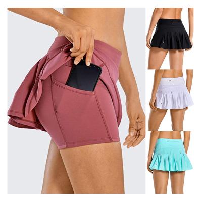 China New SKIRTS Solid Color Sports Gaiters High Waist Double Layer Gym Shorts With Pockets Women's Tennis Skirts for sale