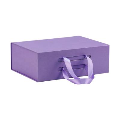 China Custom Luxury Foldable Packaging Materials Box Recycled Purple Clothing Gift Box With Ribbon for sale