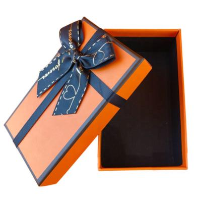 China Recycled Materials Custom Luxury Kraft Paper Clothing Hard Cover And Base Gift Box for sale