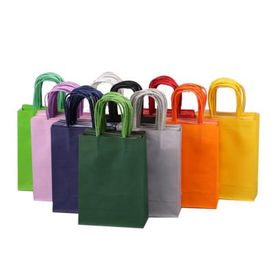 China Hot Sale Recycled Materials Logo Kraft Paper Bag Recyclable Custom Custom Printed Colorful Packaging Bags For Clothing for sale