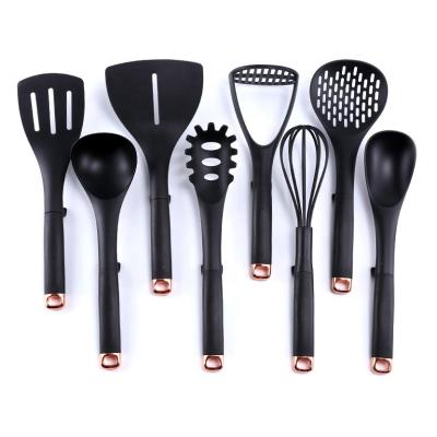 China Best Sustainable 8 Piece Kitchen Plastic Nylon Cookware Set Non Stick Black With Rack For Home for sale