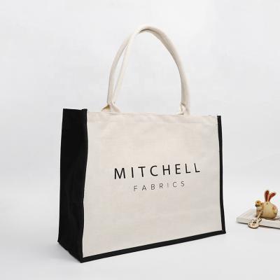 China Fashion Style Cotton Shopping Bag Custom Logo Luxury Handled Canvas Bag For Clothes Packaging for sale