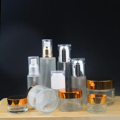 China Personal Care Luxury Low Moq Frosted Empty Cream Jar And Pump Spray Bottle Set Skin Care Glass Packaging for sale