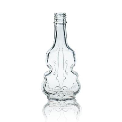 China Wine 45ml Mini Violin Shaped Clear Glass Wine Bottle With Metal Lid for sale