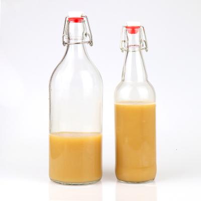 China 500ml 530ml 1000ml Empty Glass Bottles Eco-friendly Recyclable Custom Beer Juice With Swing Top Cap 330ml for sale