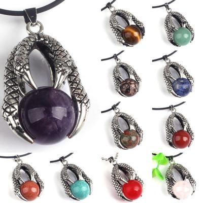 China Natural Stone Crystal Round Bead Retro Style Dragon Claw Pendant Jewelry from crystal 16mm for sale