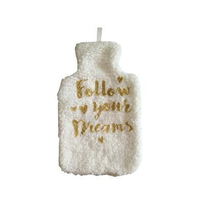 China Natural Rubber Follow Your Dream Super Soft Luxury 2000ml Target Hot Water Bottle With Gold Printing Sherpa Cover for sale