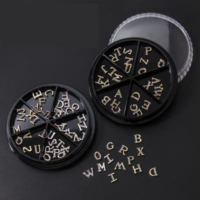 China Nail Charms Jewelry RTS Wholesale 26 Letters Alphabet Nail Mental 3D Self-adhesive Nail Decal Stickers Zircon Jewelry Luxury Accessories For Nail for sale