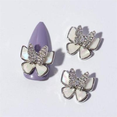 China Nail Charms Jewelry RTS Luxury Silver White Precious Butterfly Nail Decals Art Salon 3D Diamond Nail Decoration For Stick On Nails for sale