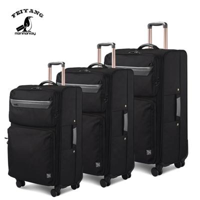 China Polyester Luggage Bag Large Capacity Travel Suitcase Waterproof Luggage for sale