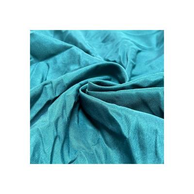 China Hot Sale Memory Fabric Woven Fabric Home Textile Flexibility 100% Polyester Dyed Aquamarine Blue For Bedding for sale