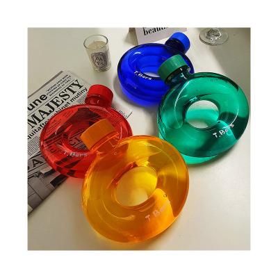 China Customized Creative High Quality Viable Donuttle Kids Drinking Cups Cute Portable Neck Donut Hanging Water Bottle for sale