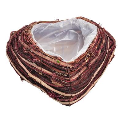 China Heart Shape Rattan Flower Pot Sustainable Garden Planter With Natural Material for sale