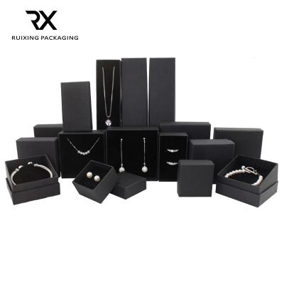 China Wholesale Custom Square Ruixing Logo Black Kraft Paper Jewelry Gift Box for sale