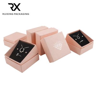 China Wholesale Customizable Square Ruixing Badge Rose Jewelry Gift Box With Sponge Core, Suitable For Ring Earring Necklace for sale