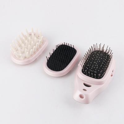 China MAN HM620 Battery Powered Portable Mini Ionic Hair Brush Travel Use Nondisposable Compact for sale