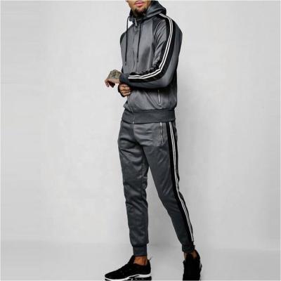 China 2020 Custom Slim Fit QUICK DRY Mens Striped Polyester Casual Trackpants Tracksuit For Men Sweatsuit for sale