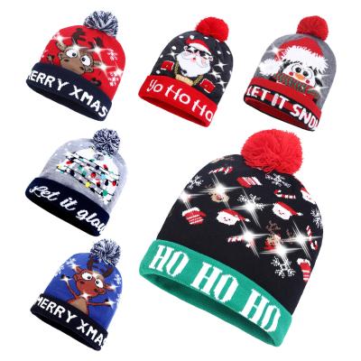 China Wholesale JOINT Children Led Christmas Knitted Hat With Flashing Light Kids Christmas Party Hat for sale