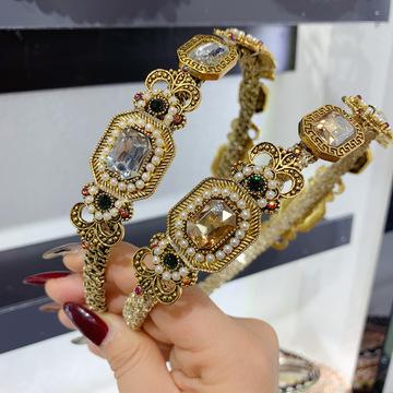 China 2022 Vintage Women's Diamond Crystal Pearl Headbands Fashionable Metal Hair Bands for sale