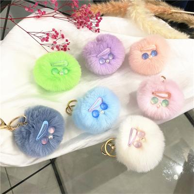 China Wholesale Cute Metal Kids Key Chains Furry Doll Car Rings For Girls for sale