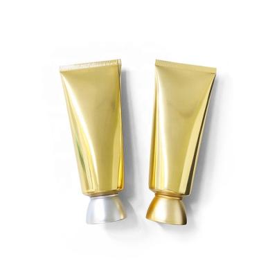 China Classic Ready To Ship Bright Gold Aluminum Plastic Facial Detergent 100ml Hand Cream Lotion Bottle Sets With Acrylic Cap for sale