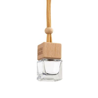 China Personal Care Wooden Car Aroma Diffuser 8ml Hanging Car Perfume Bottle for sale