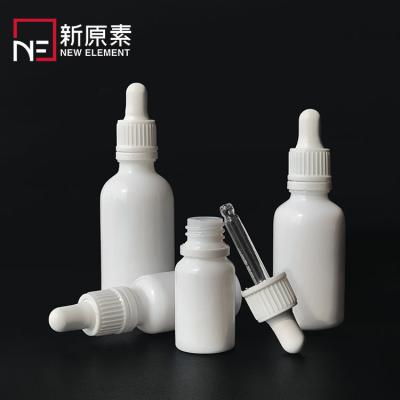 China Classic Cosmetic Packaging Serum Bottles 10ml 15ml 20ml 30ml 50ml 100ml White Glass Cbd Oil Dropper Bottle With Child Safe Cap for sale