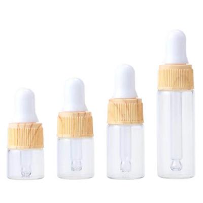 China 1ml 2ml 3ml 5ml Classic Clear Glass Serum Bottles Small Face Massage Perfume Oil Dropper Glass Bottle for sale