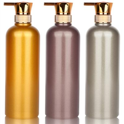 China Light Luxury Round Gold Rose Gold 750ml Gold Airless Shampoo Shower Gel Pump Lotion Bottle Airless Packaging for sale