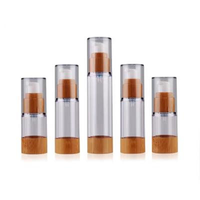 China Personal Care Packaging 15ml 30ml 50ml Bamboo Airless Cosmetic Vacuum Pump Bottle With Bamboo Spray Lotion Pump Lid for sale