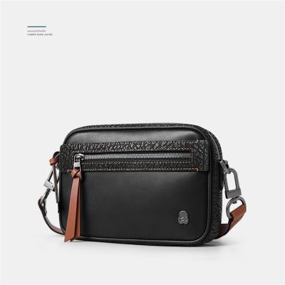 China Whip Good Quality Solid Color Cowhide / Polyester Lining Messenger Bag For Men Comfortable Cross - Body for sale