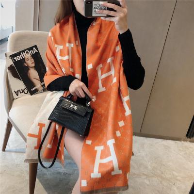 China The newest women's scarf scarf autumn and winter new H letter cape temperament warm cape of imitation cashmere cashmere for sale