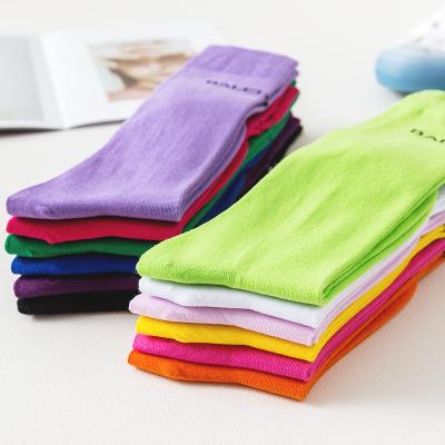 China 2021 new autumn/winter red color tube pile hosiery sporty women long leg street socks fashion net cotton all-match for sale