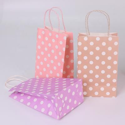 China Dot White Kraft Paper Gift Handbag Eco-Friendly Fresh Polka Dot Shopping Bag Small Takeout Paper Bag for sale