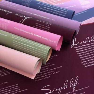 China 2021 Disposable Matte Flower Paper Wrapping Tissue Waterproof English Printing Wrapping Paper For Flower for sale