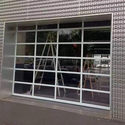 China Waterproof automatic steel sectional glass garage door tempered glass aluminum garage door for houses for sale