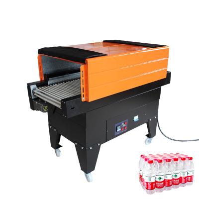 China Small Beverage Heat Shrinkable Film Packaging Machine Shrink Film Vacuum Packing Machine for sale