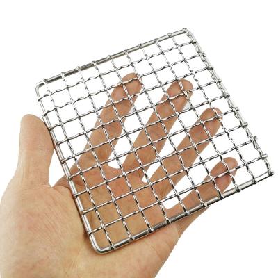 China Other New Stainless Steel Portable Outdoor Firewood Rack Camping Pot Rack BBQ Mesh Outdoor Camping Stove for sale