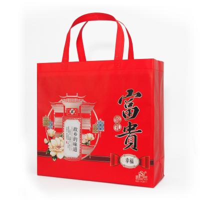 China Mid Autumn Festival Factory Happy New Year Wholesale Handled Shopping Bags Recycling Nonwoven Waterproof PP Tote Bag Red Color for sale